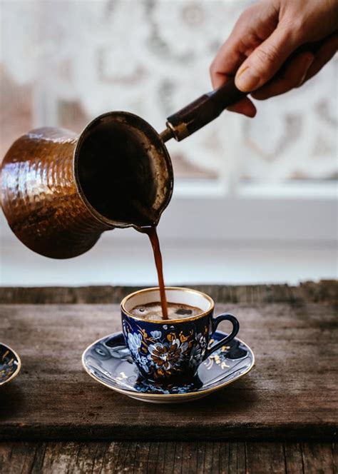 How to make turkish coffee - Step 2: Preparation · Fill the ibrik or cup with water and bring the water to a boil. · For each espresso sized cup, put a level teaspoon of coffee into the pot ...